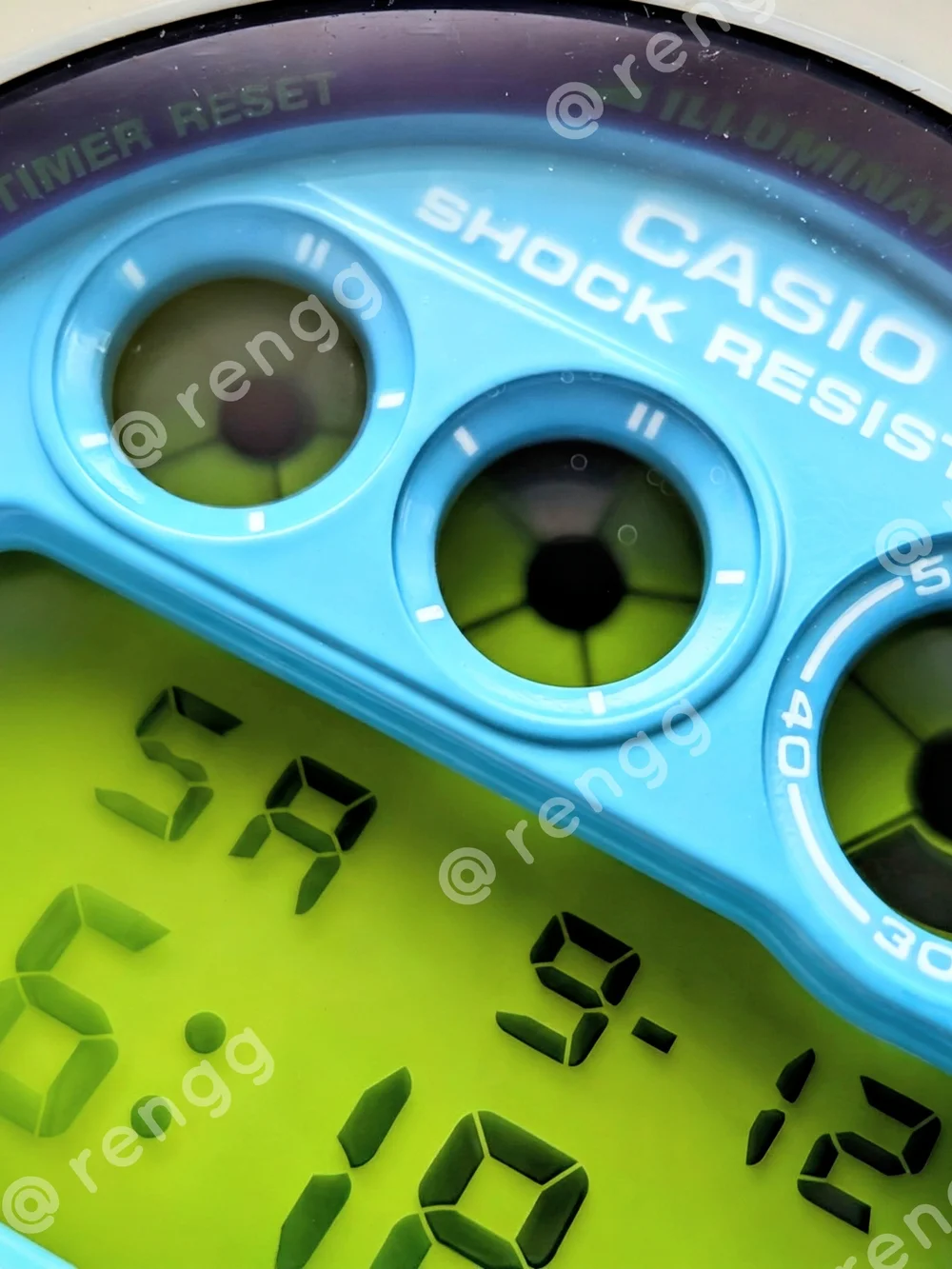 G-Shock White Resin Digital Watch with Blue Dial and Green Accents